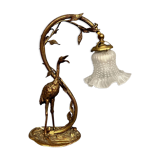 Gilded bronze lamp with the figure of a heron in Art Nouveau style.