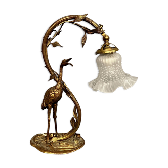 Gilded bronze lamp with the figure of a heron in Art Nouveau style.