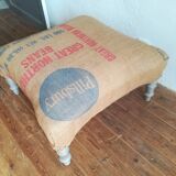 Ottoman pouf rests foot