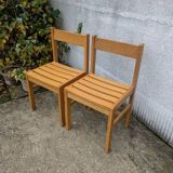 Paire de chaises de style André Sornay