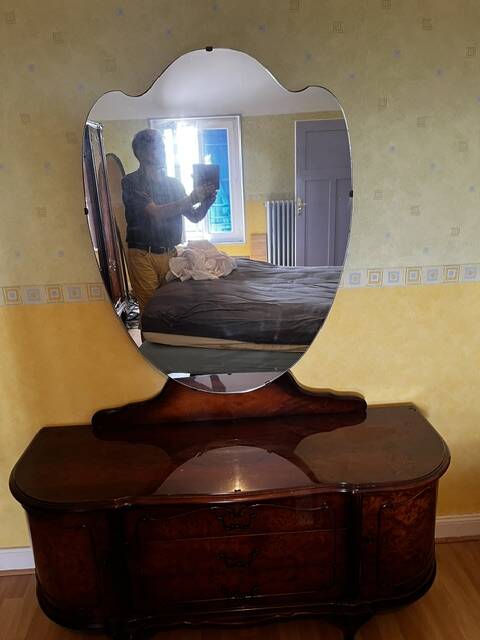 Coiffeuse art deco avec miroir biseauté de forme ovale