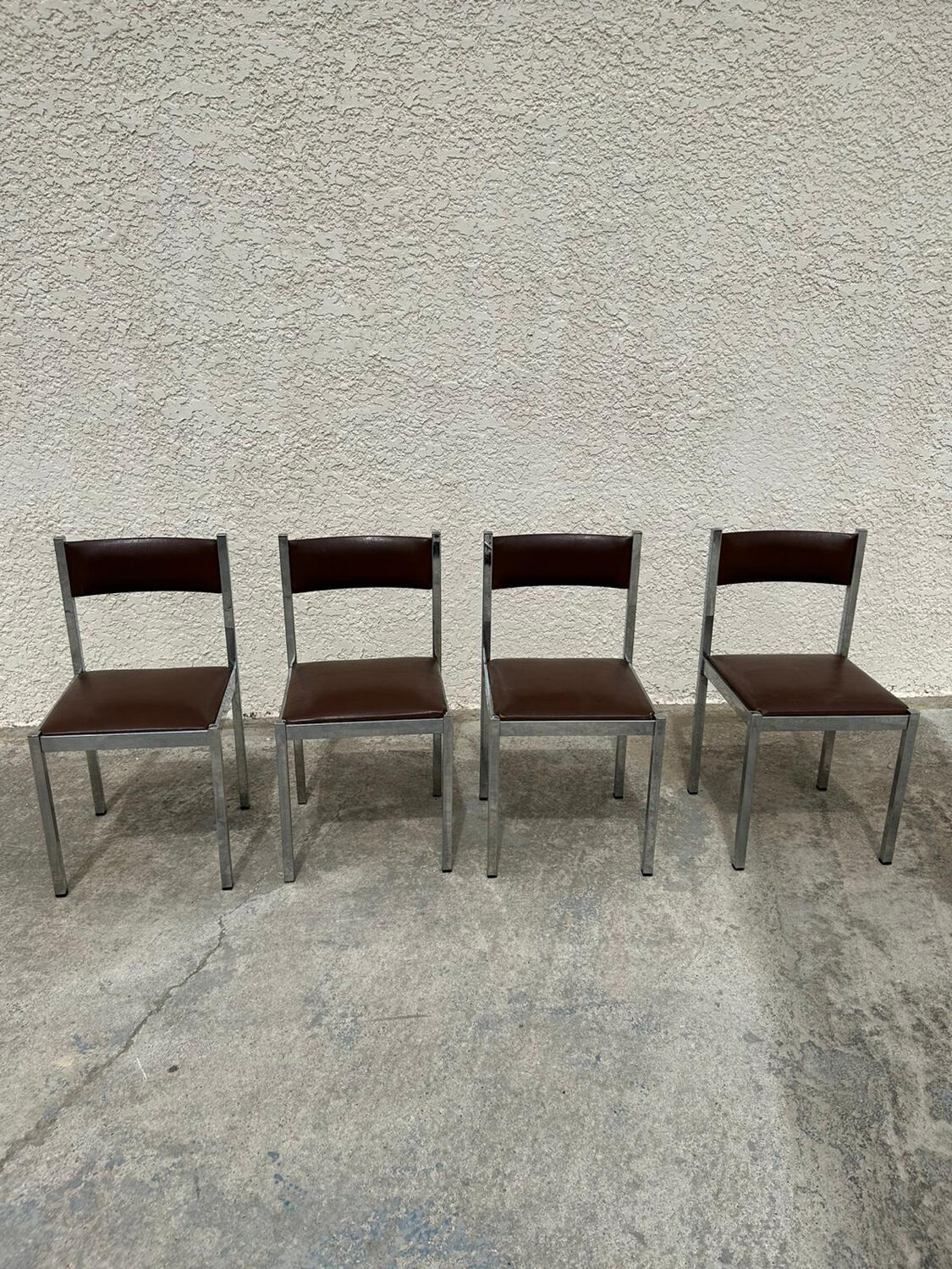 4 vintage leather/iron chairs