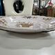 Decorative porcelain plate with hanging signed VP