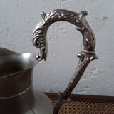 Old glass and silver metal wine carafe