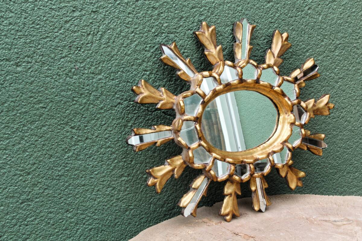Sun mirror with parecloses, carved wood