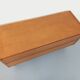 Small vintage Scandinavian sideboard in modernist style made of light oak wood.
