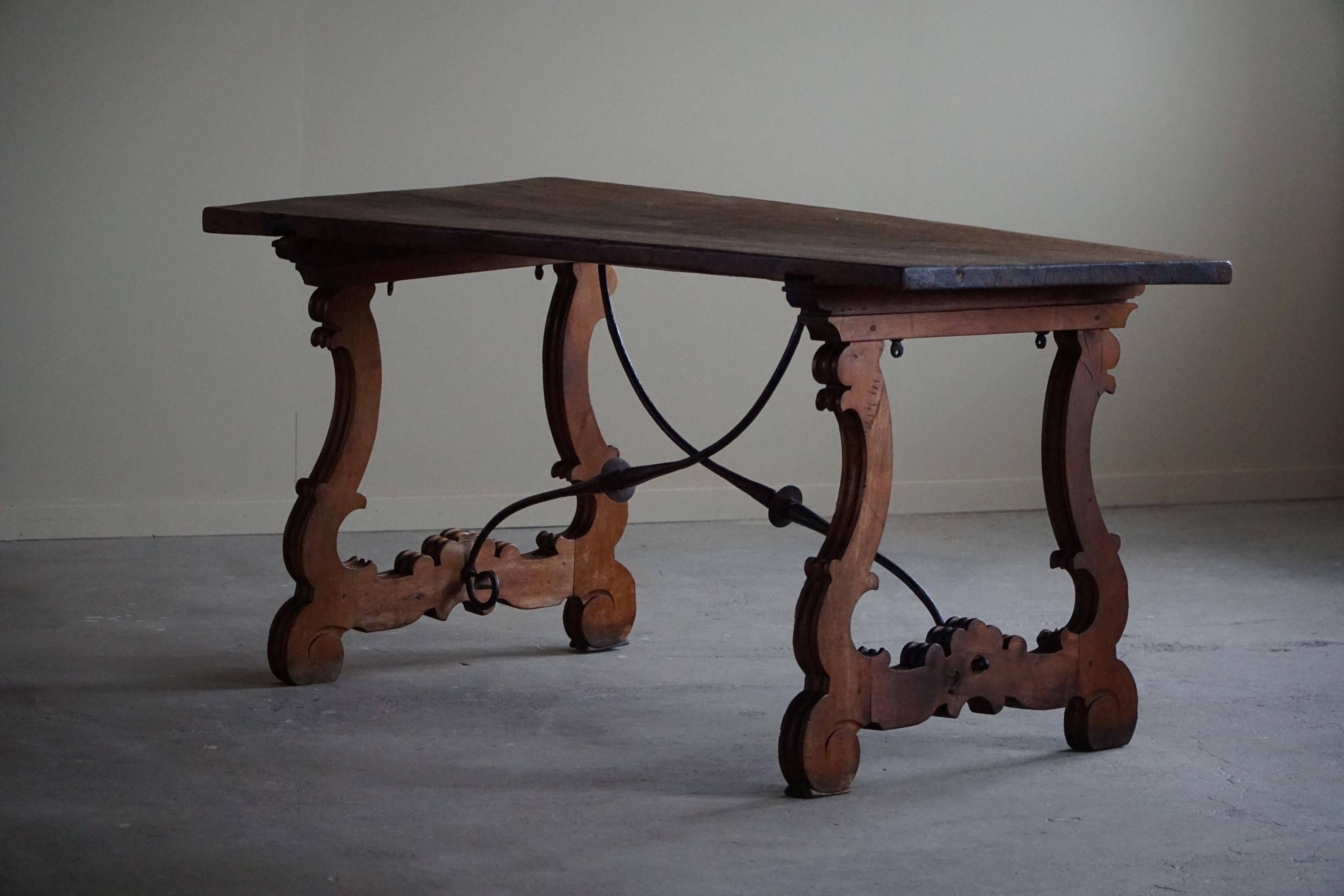 Brutalist table in antique Spanish solid oak and wrought iron, 19th century.