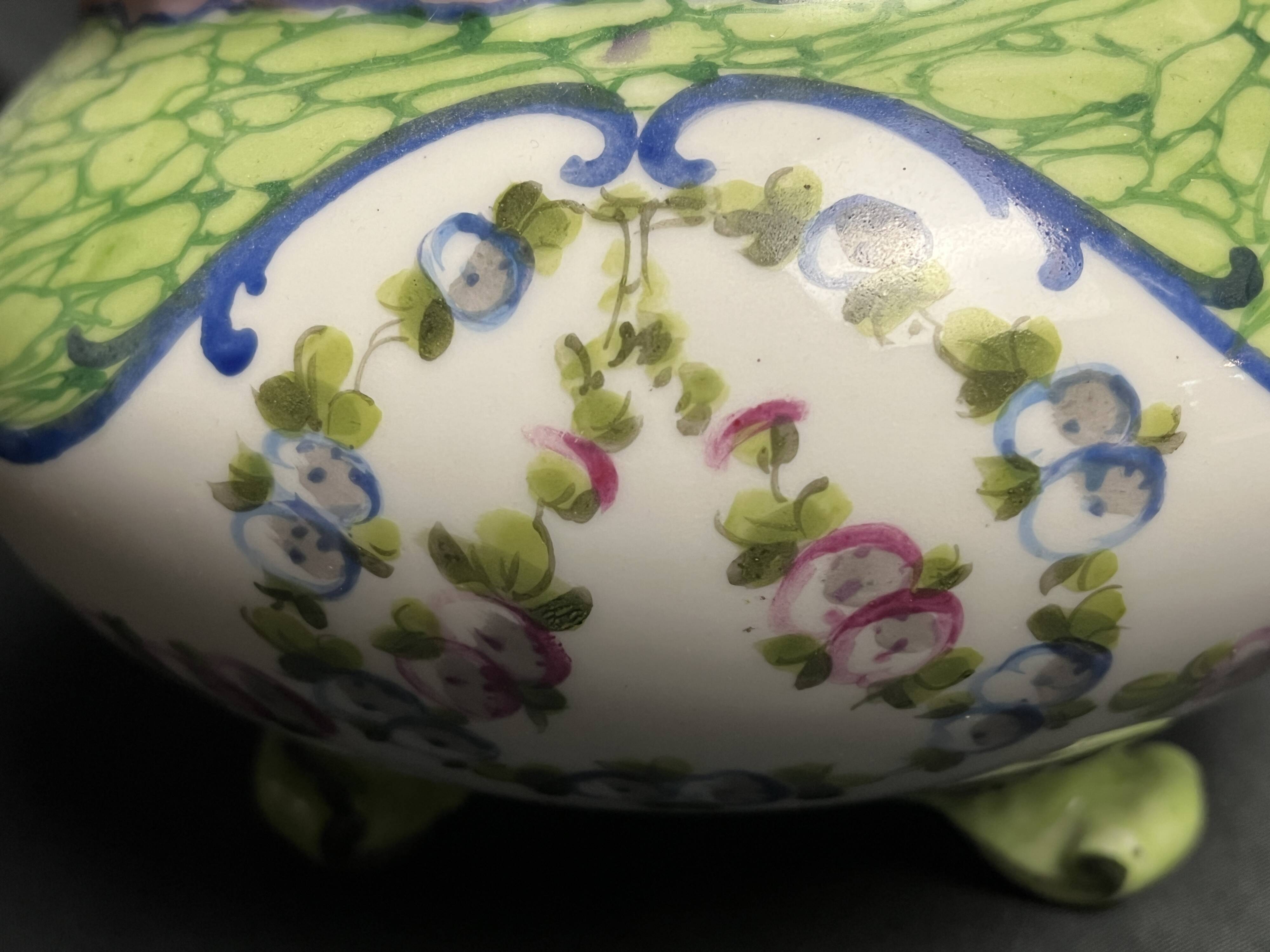 Sèvres, 20th century porcelain tripod planter with floral decoration