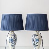 Pair of Royal Delft blue and white ceramic table lamps, 1905, with new pleated silk shades.