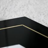 Miroir années 70, bois laqué noir, liseret  laiton. Octogonal