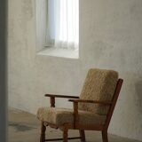 Danish modernist lounge chair in oak and lambswool, Henning Kjærnulf, 1960s