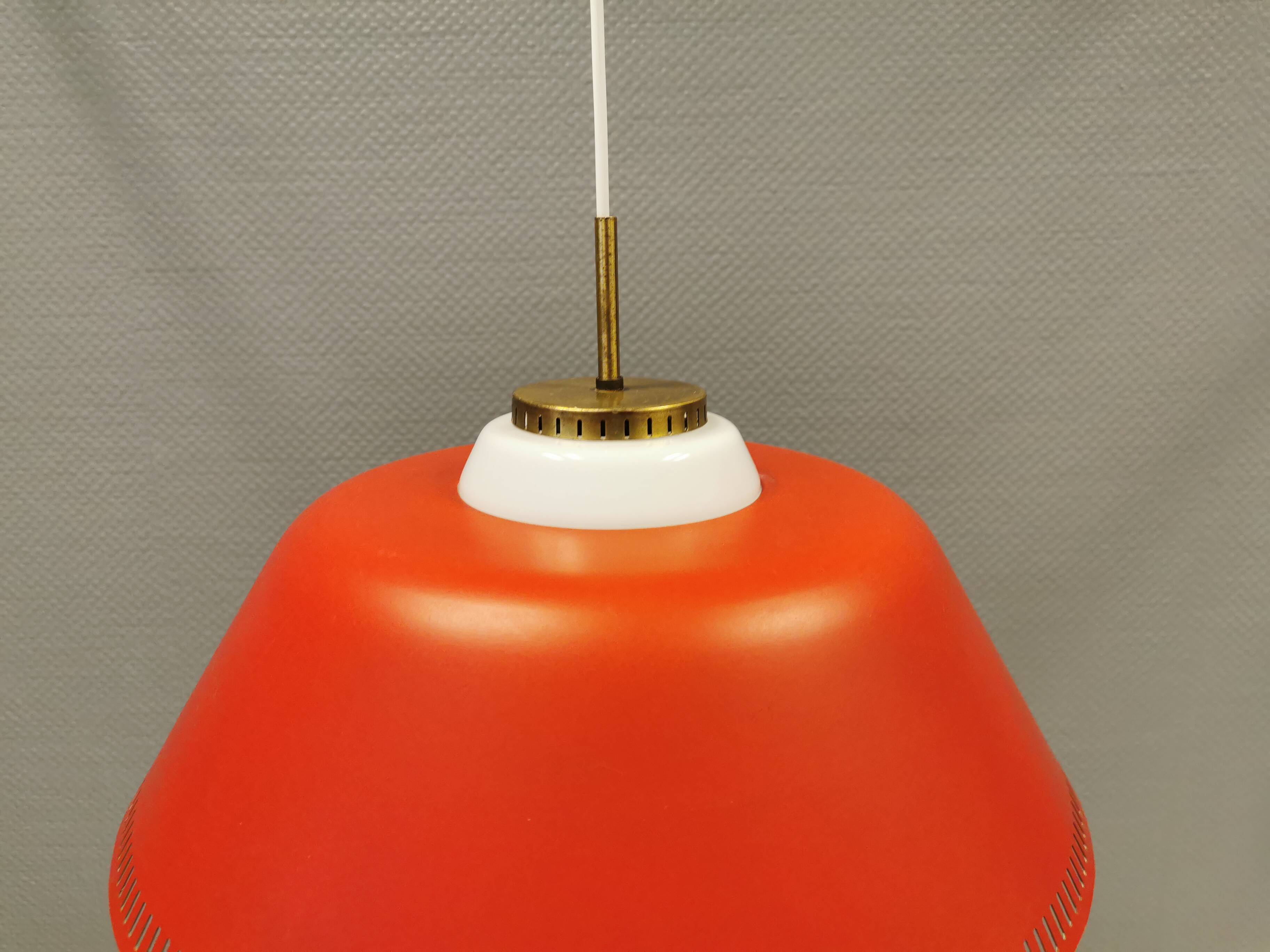 Hanging lamp in red lacquered metal and milky white opal glass 1970s Denmark.