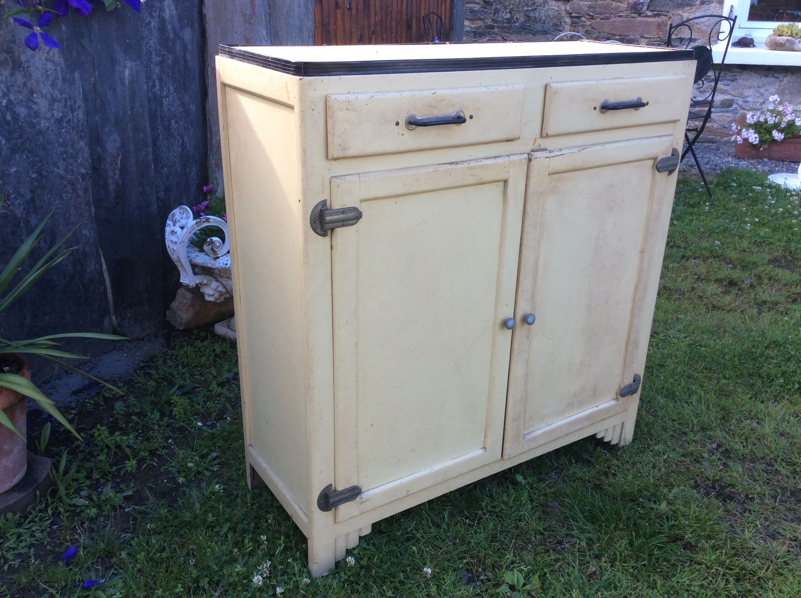 Parisian buffet painted in yellow with 2 doors and 2 drawers from an old Trailer.
