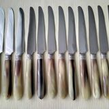 12 Apollo table knives in stainless steel and bovine horn