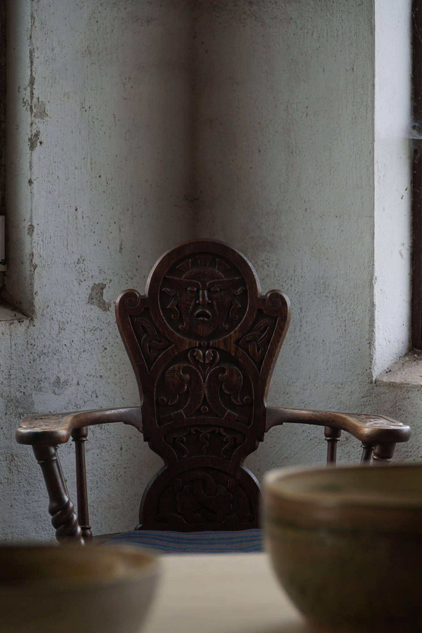 Scandinavian armchair in solid oak with cushion, folk art, early 19th century.