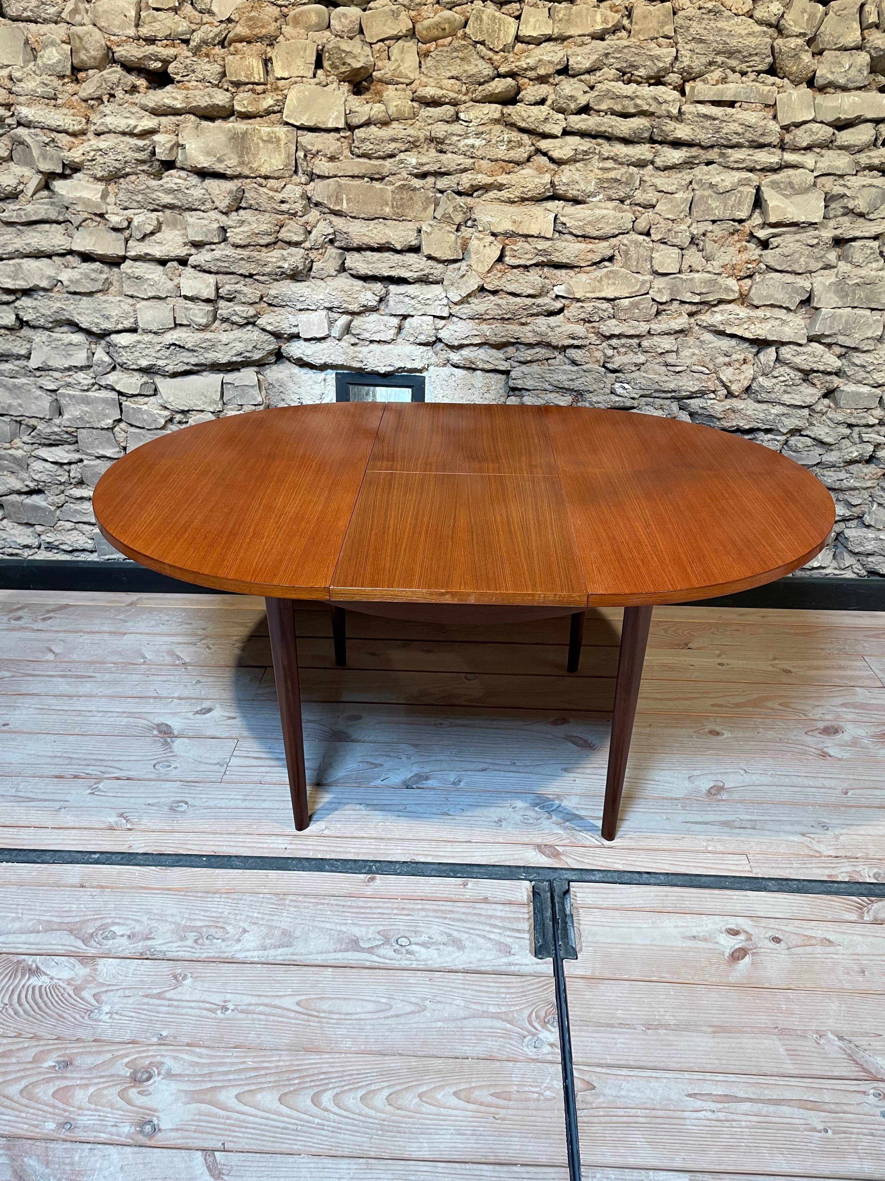Teak table, vintage Scandinavian style from the 1960s, with hidden extension