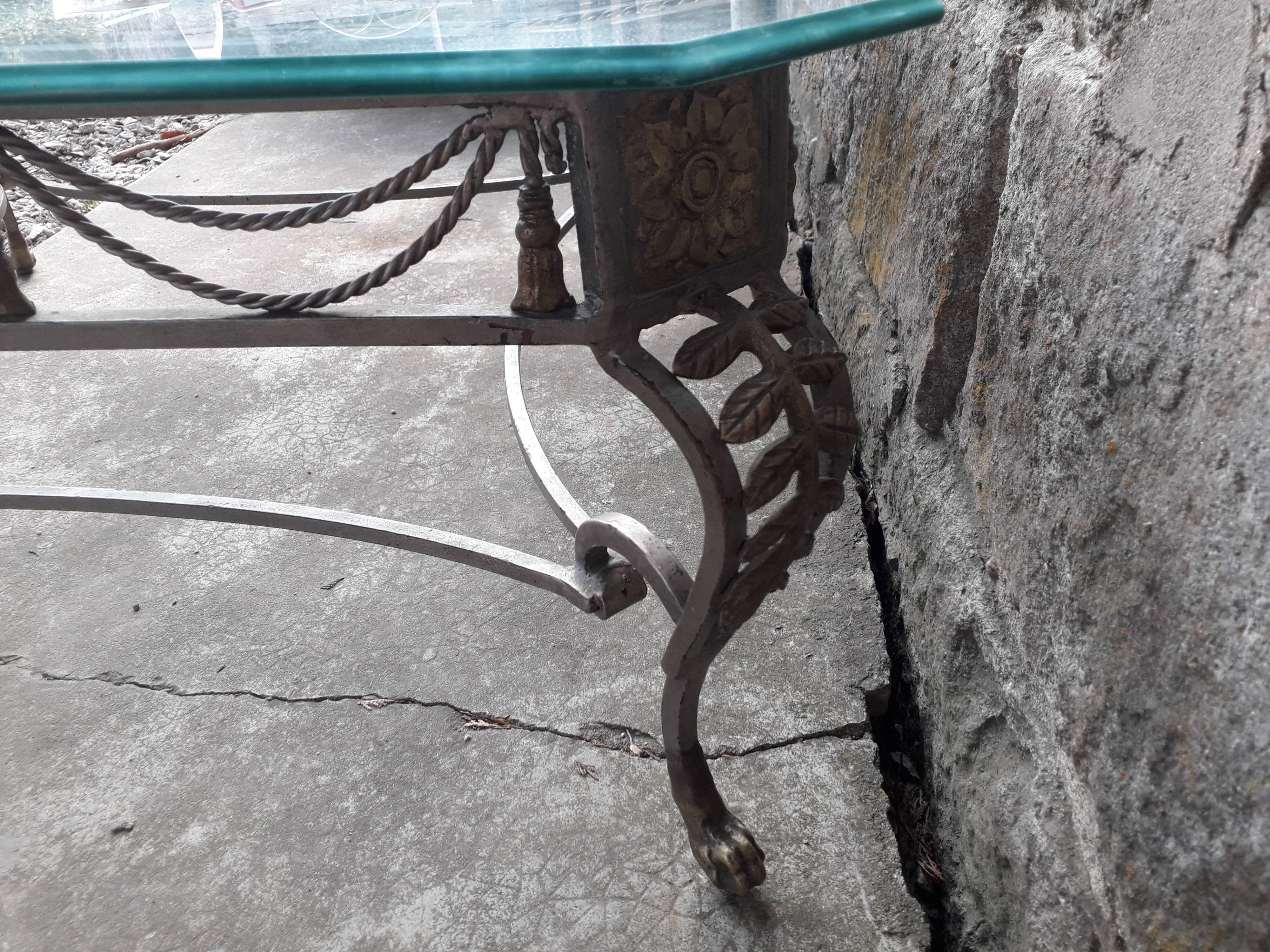 Large coffee table, wrought iron footing glass tray