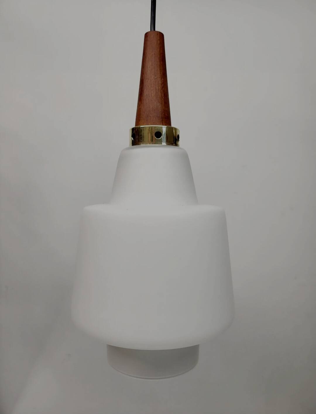 Scandinavian pendant light in opaline and teak, around 1960.