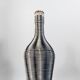 Vintage bottle in two-tone woven scoubidou.