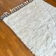 Berber carpet blessed white ouarain patterns with reliefs and black finishes