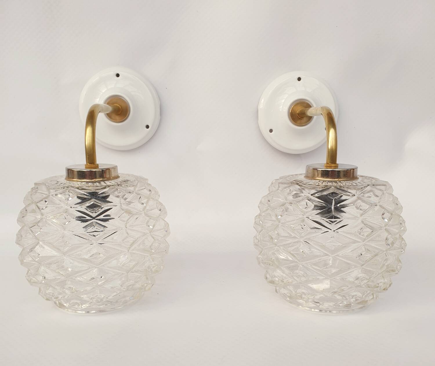 Swan neck and glass wall lights