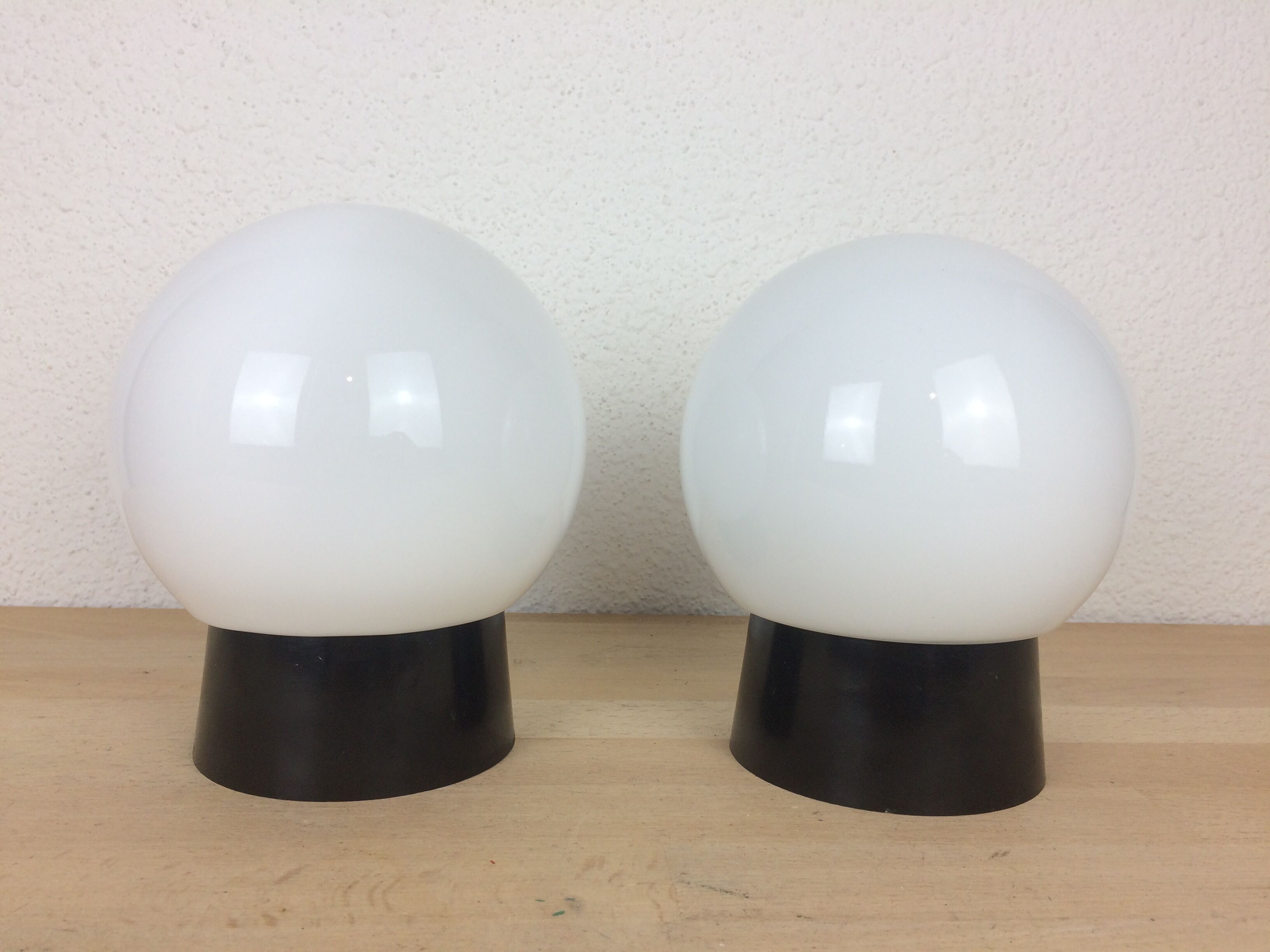 Pair of opaline globe and bakelite wall lamps RZB Leuchten