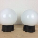 Pair of opaline globe and bakelite wall lamps RZB Leuchten
