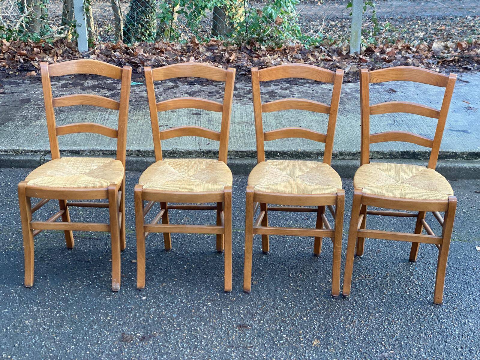 4 solid wood straw-seated Louis Philippe chairs, oak, 20th century.