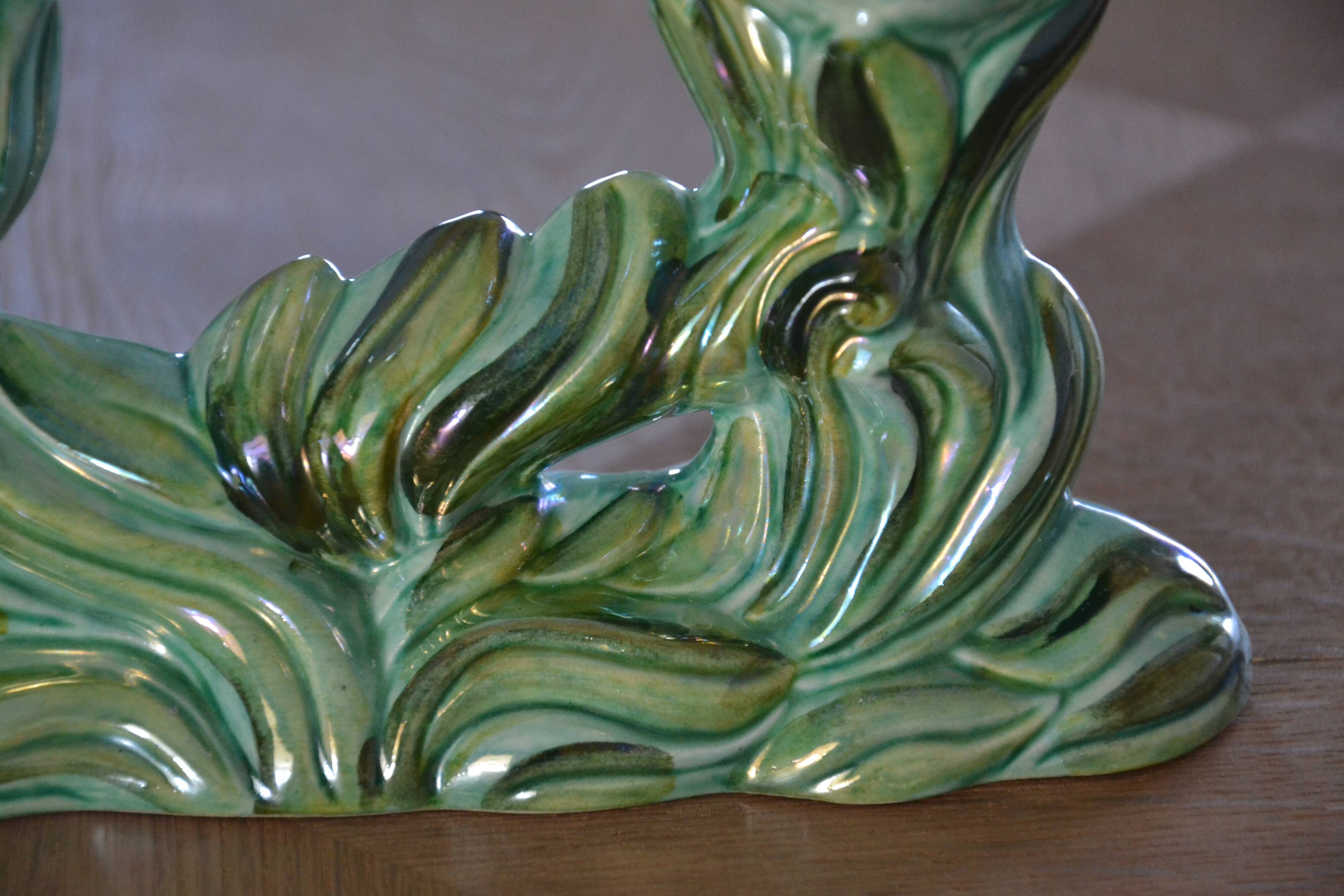 Pair of iridescent green ceramic Art Deco candlesticks