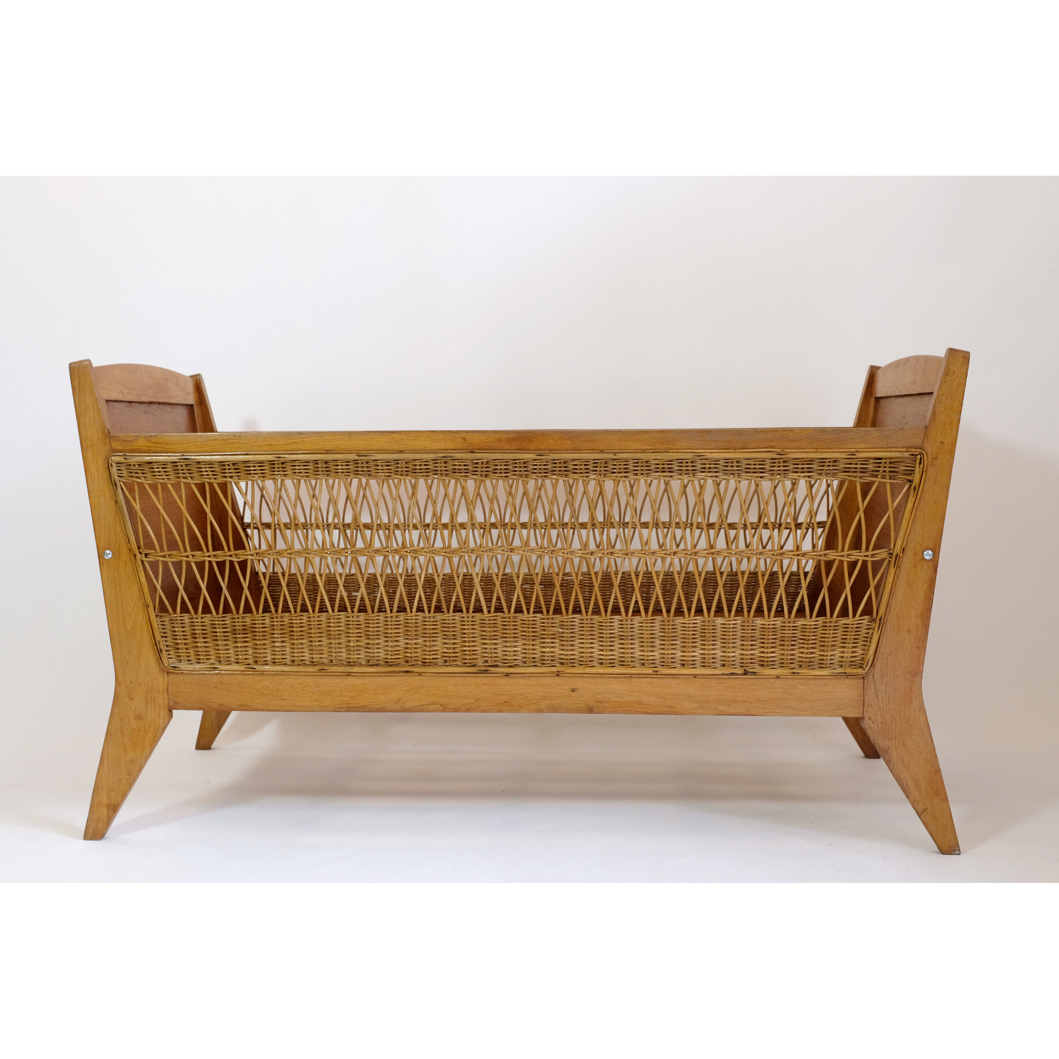 Children's bed or crib with wicker décor, 1960-1970.