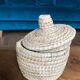 Round wicker basket with lid