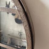 Round mirror mounted in mild steel