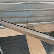 Vintage glass and chrome side table