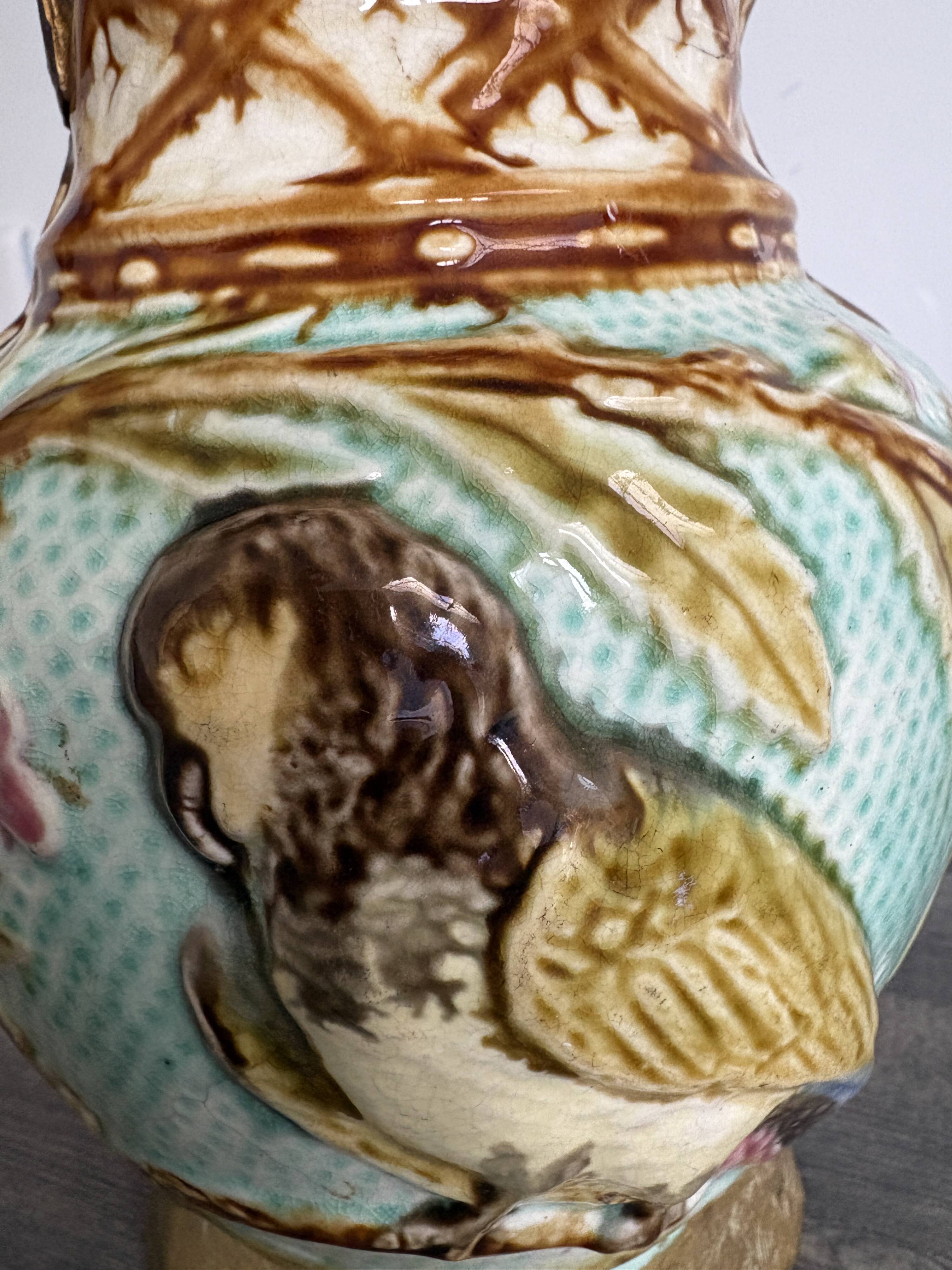 Pichet barbotine 19th century with bird decoration.