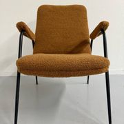Vintage metal armchair with orange boucle fabric, French design from the 1950s.
