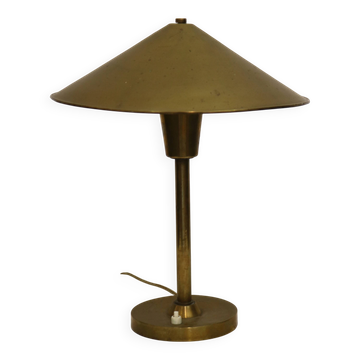 A striking messing table lamp dating from the 1950s.