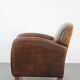 Characterful vintage sheepskin leather armchair with beautiful colours
