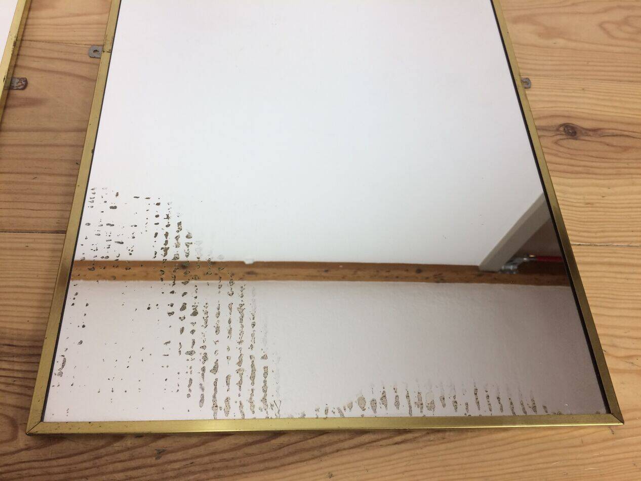 Paire de miroirs dorés 70's , 120 cm