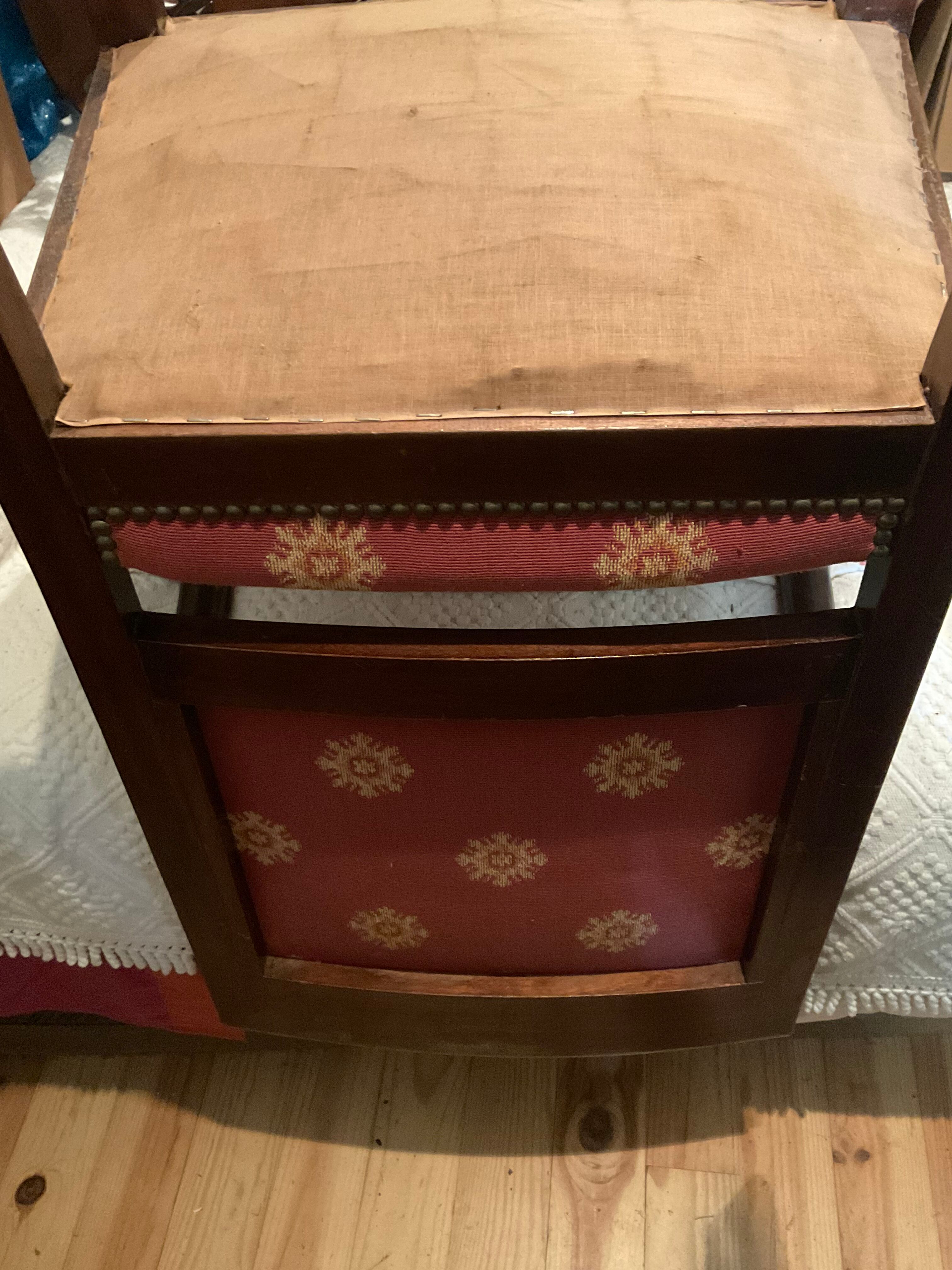 Pair of empire-style armchairs with dolphins