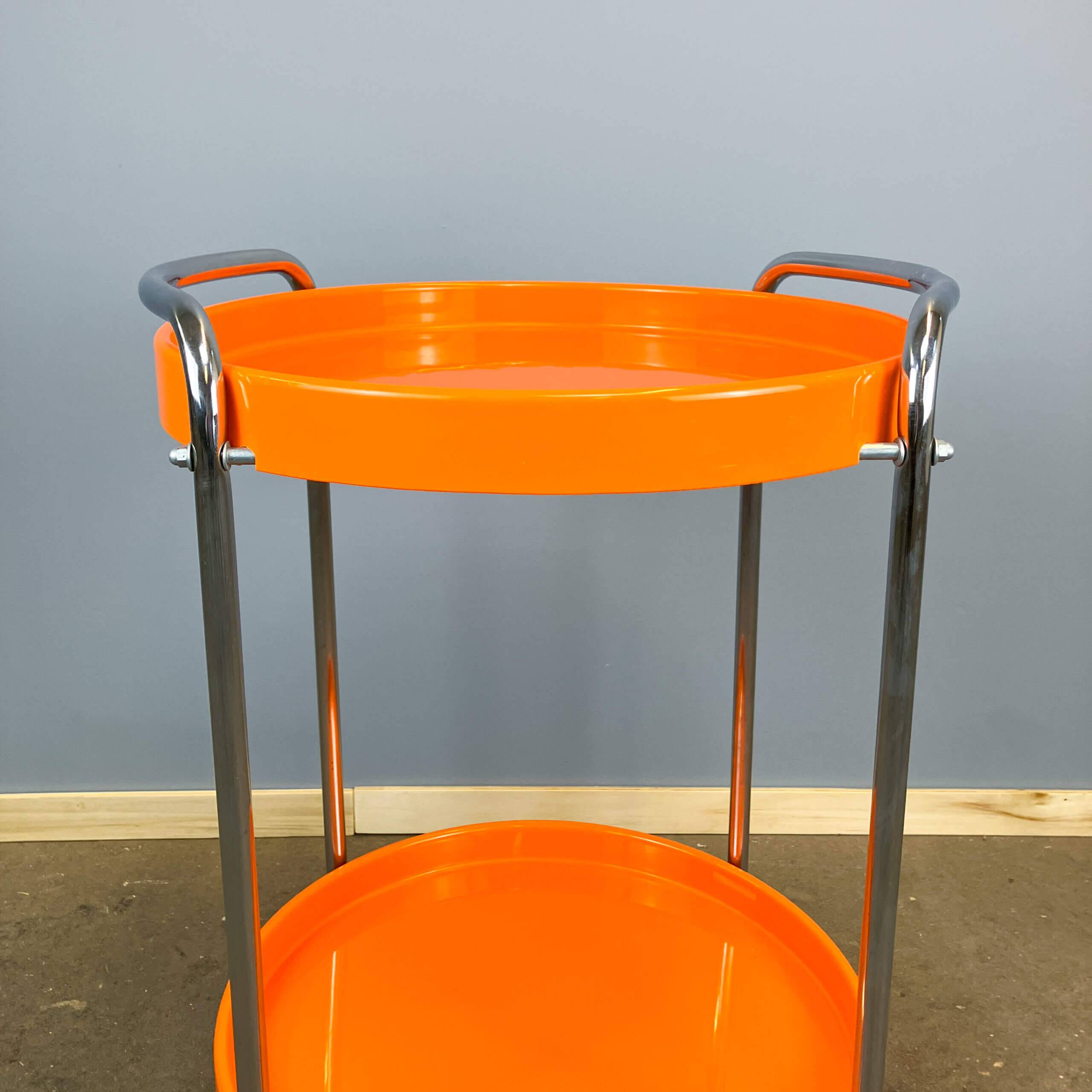 Space Age serving trolley, chrome and orange plastic trays, 1970s