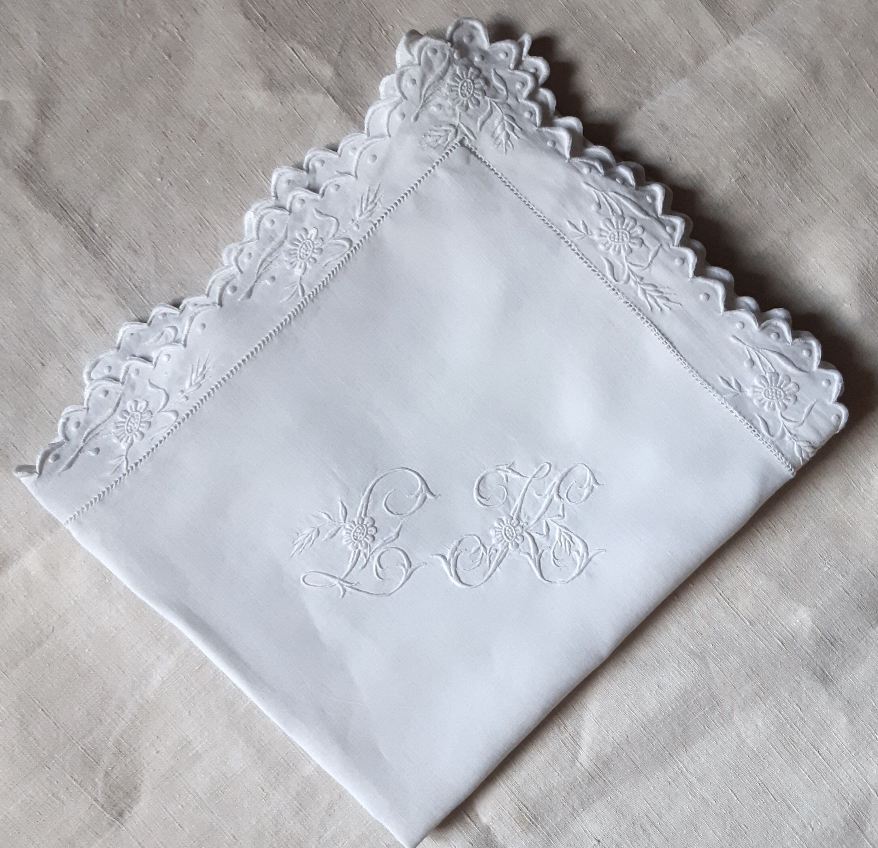 pillowcase embroidered with flowers and monogrammed festoons LK