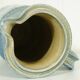 Pitcher in glazed blue sandstone signed