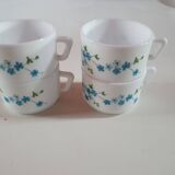 set of 4 vintage arcopal cups with small mysotis blue flowers