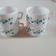 set of 4 vintage arcopal cups with small mysotis blue flowers