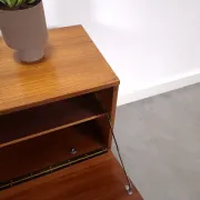 Vintage small teak cabinet with drawers, flap and black handles, hallway cabinet.