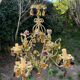 Vintage metal chandelier with porcelain flowers.