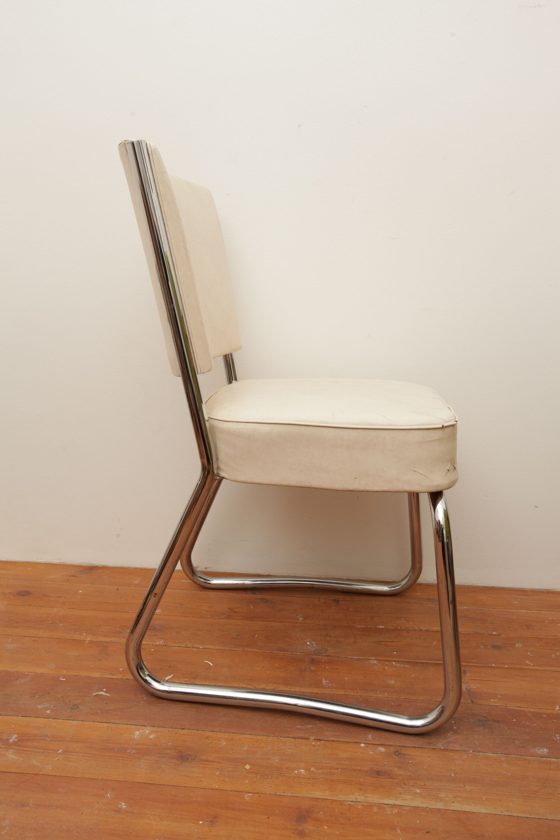 Fauteuil skaï blanc