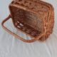 Old wicker basket with diamond-shaped decorations