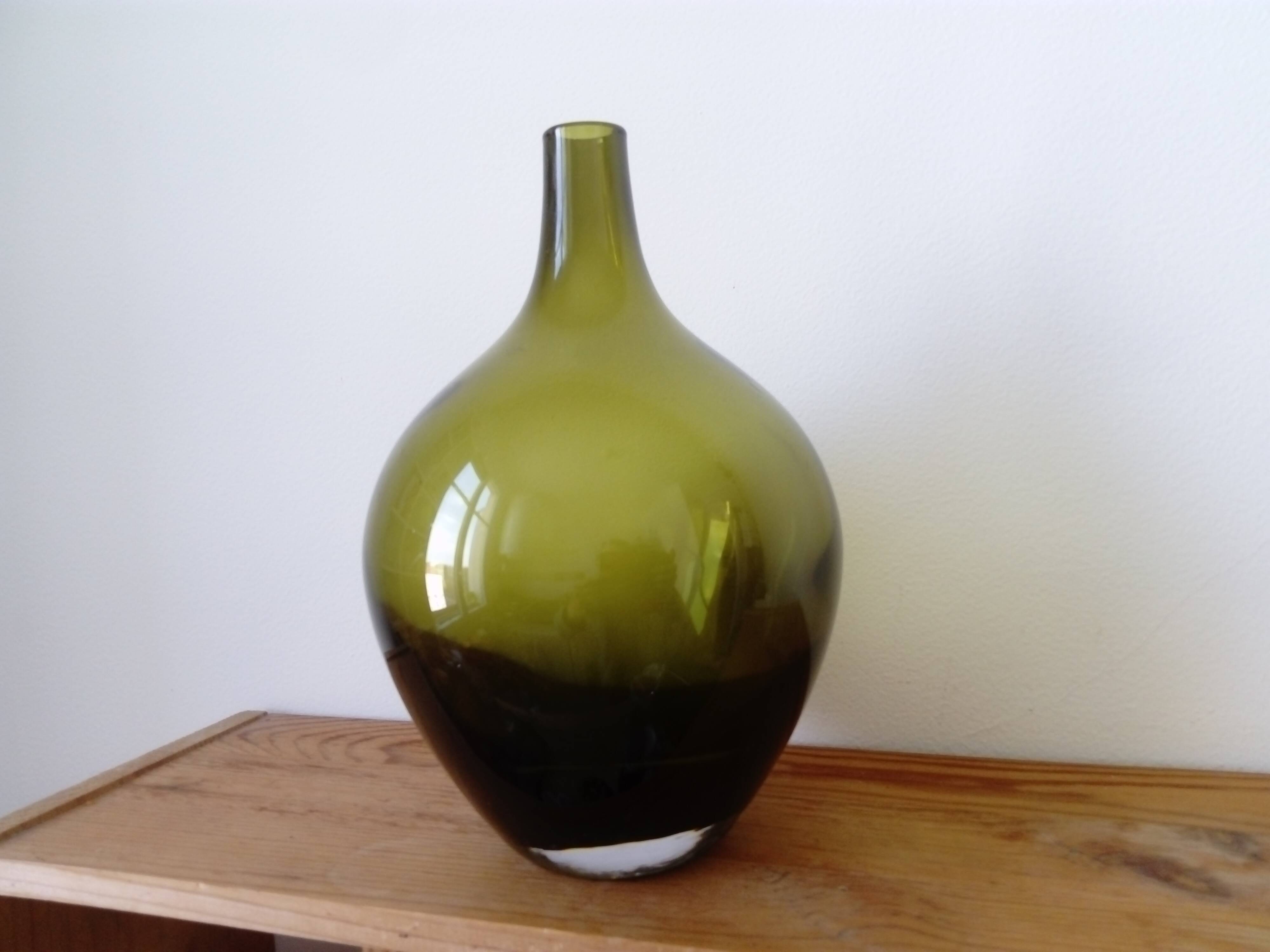 dark green drop-shaped glass vase