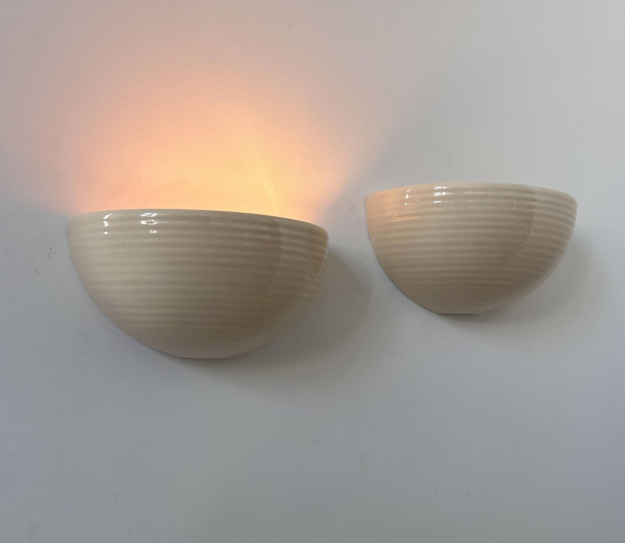 Pair of vintage wall lights, beige porcelain, France 1970
